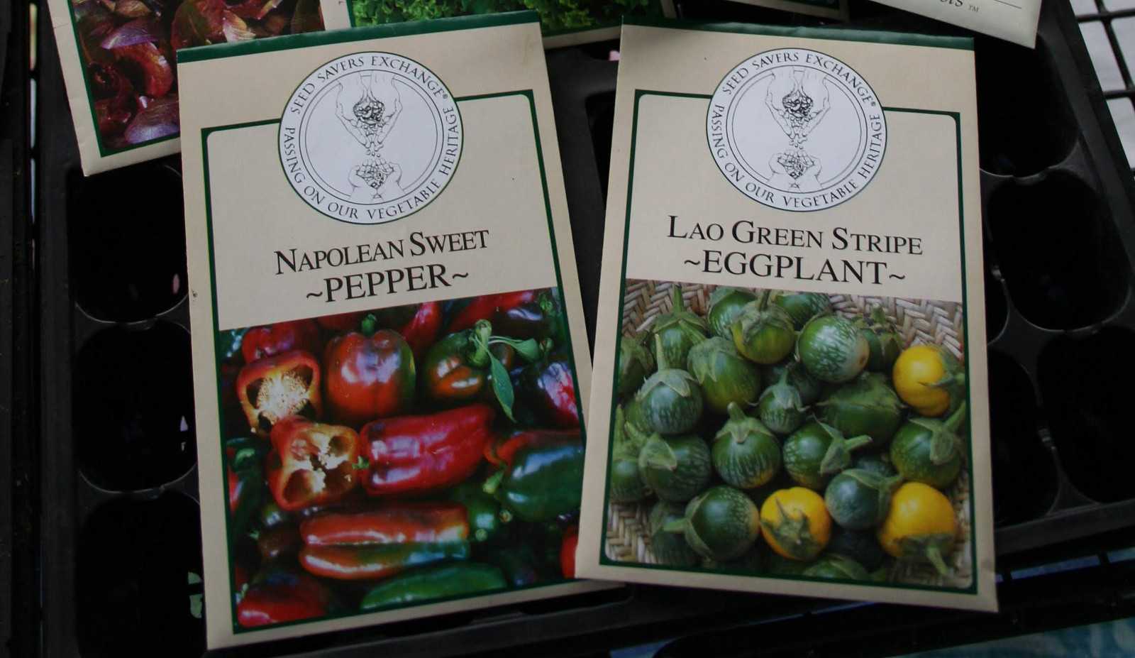 Seed packets for napoleon sweet peppers and lao green stripe eggplant