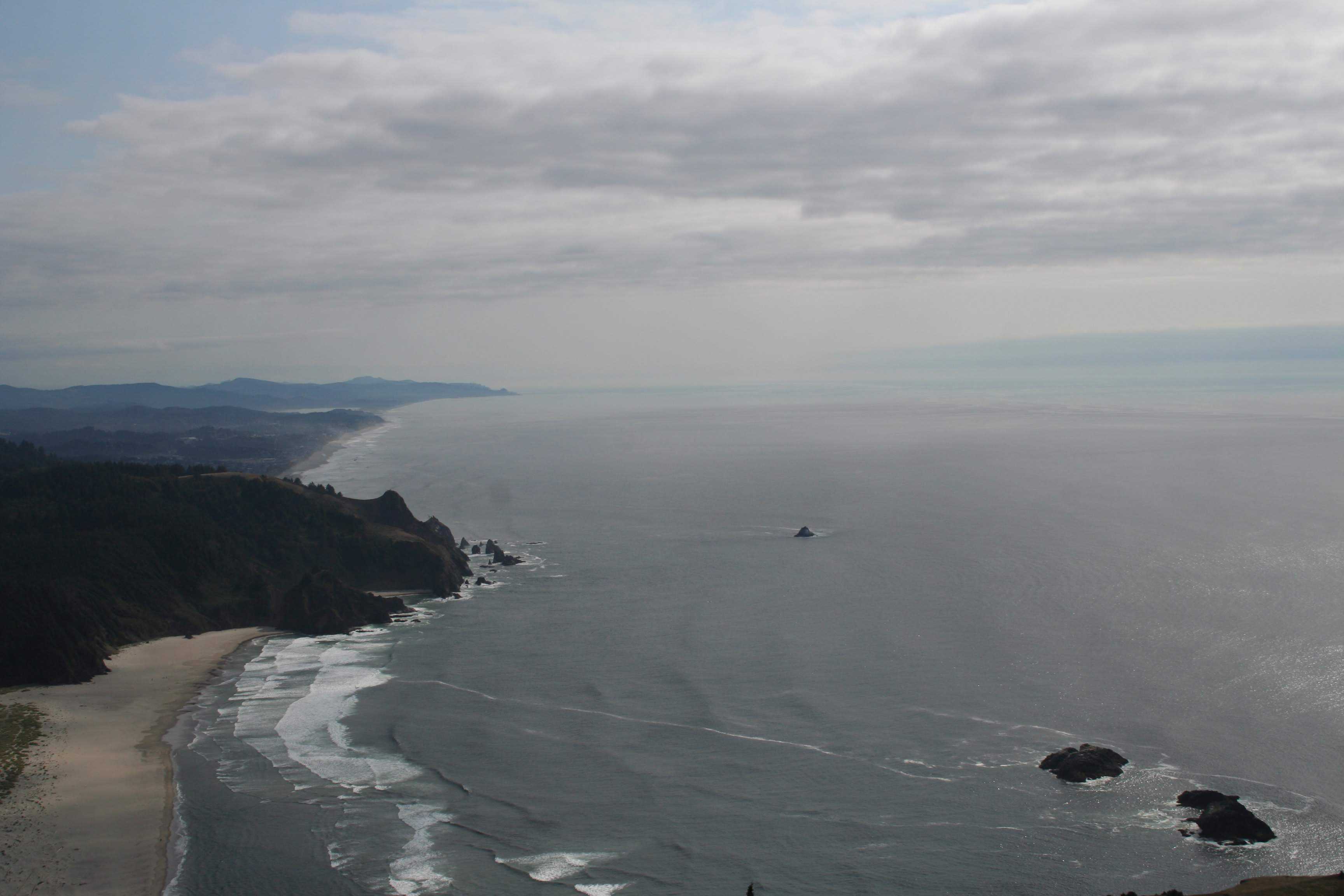 The view looking south west from the high viewpoint with the coastline on the left and the ocean on the right
