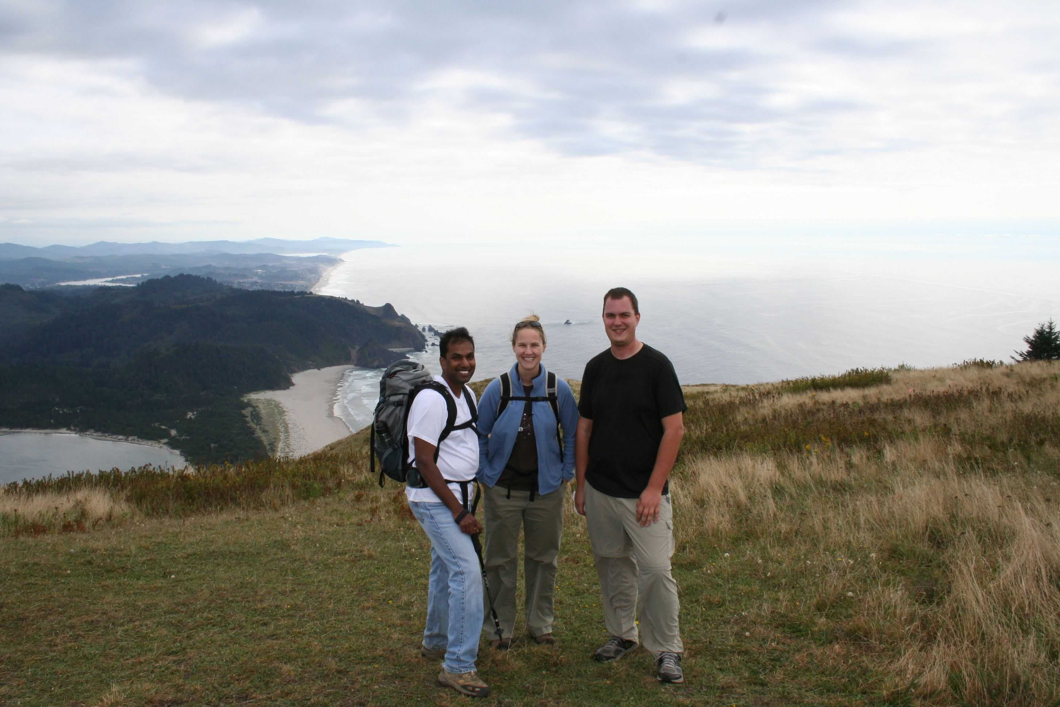 Sam, Elyssia, and David at Cascade Head with the ocean behind us
